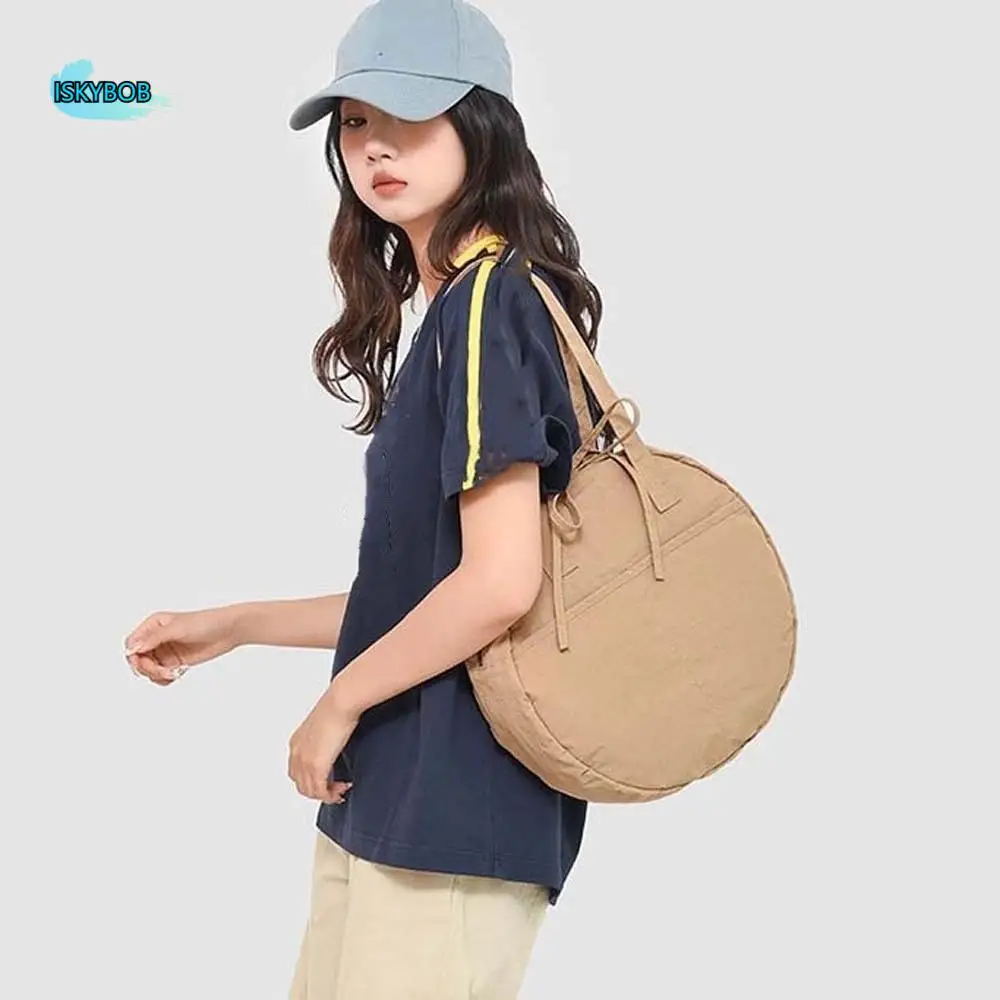 

Круглая сумка на плечо в японском стиле, однотонная ткань Оксфорд, большая вместительная сумка, портативная повседневная женская сумка с бантом, школьная сумка