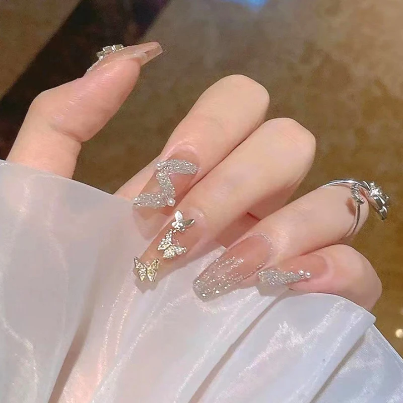 10 pçs diy decoração da arte do prego 3d prata borboleta brilhante strass brocas de unhas para manicure design acessório