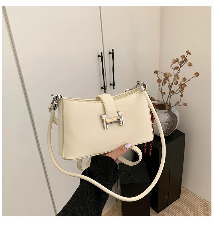 

‌2025 Luxury Baguette Bag - Women's Spring Summer Underarm Shoulder Bag | Niche Geometric Design & Adjustable Chain Strap‌