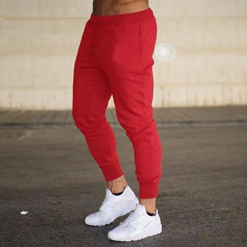 Męskie spodnie sportowe długie spodnie spodnie do joggingu boczne kieszenie elastyczne wygodne i ciepłe sportowe jednolity kolor slim fit casual