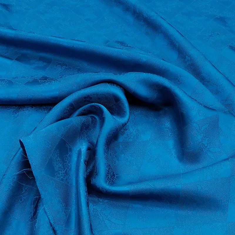 The elegant and refined cheongsam Hanfu dress made of silk satin with hollowed-out jacquard fabric