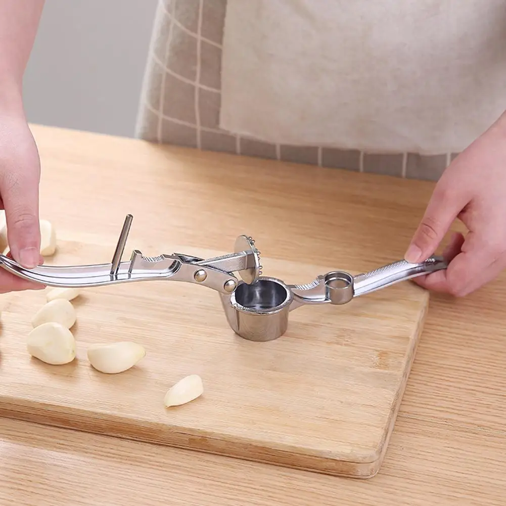 

1pcs Stainless steel garlic masher Garlic Press Kitchen juicer grinder Accessories Tools Garlic press Manual ginger tool Ma P0T3