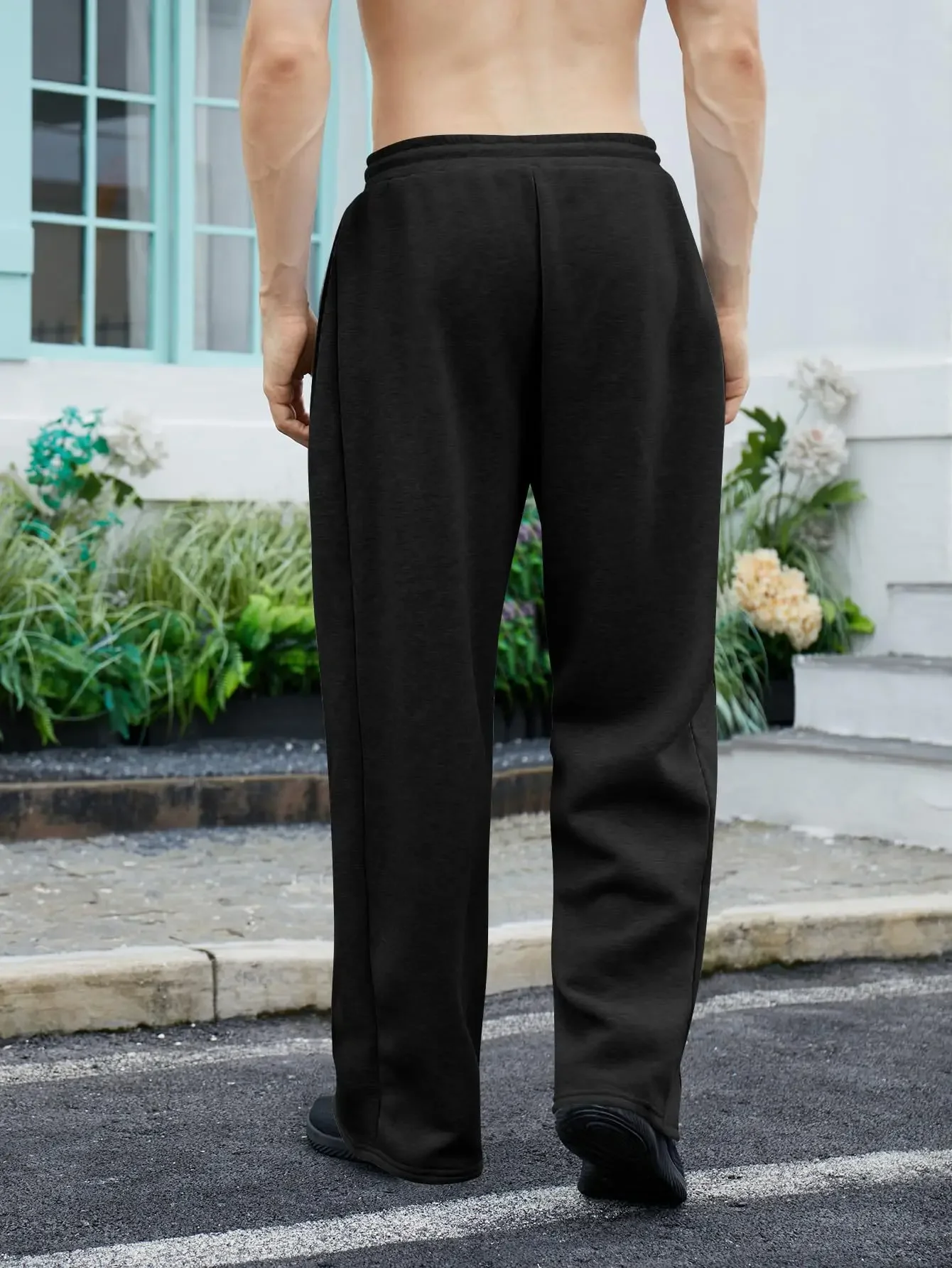 Black casual wide-leg pants, drawstring elastic waistband, suitable for both men and women for cold seasons and providing warmth