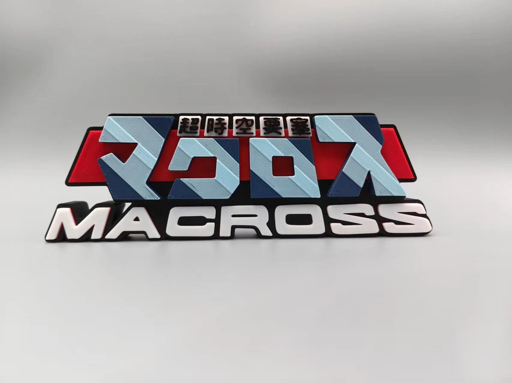 Fuente tridimensional Robotech / Macross Logo, extraña, placa de identificación, emblema, adorno decorativo de alto nivel de apariencia.