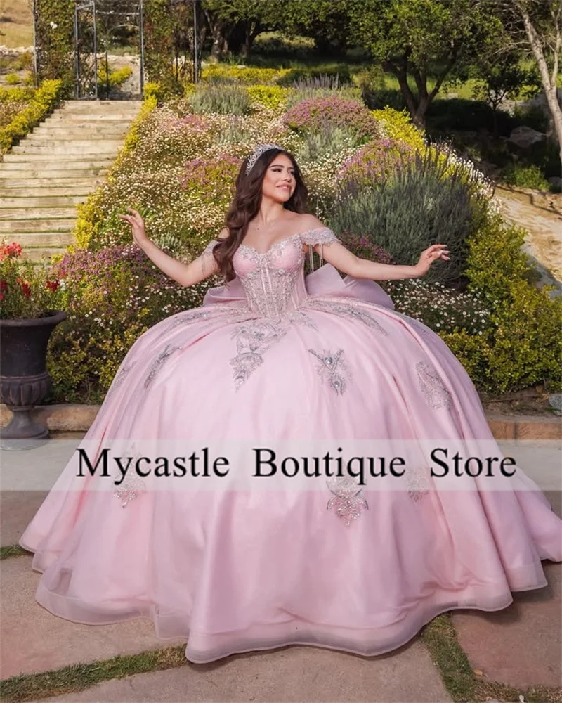 

Customized Pink Tulle Ball Gown Appliques Princess Quinceanera Dresses 2025 With Bow Beaded Corset Off Shoulder Birthday Dress