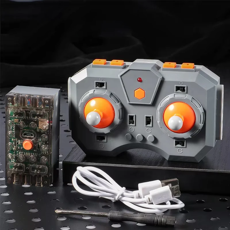 

The programmable building block remote control supports action arrangement and real-time speed control through a mobile app