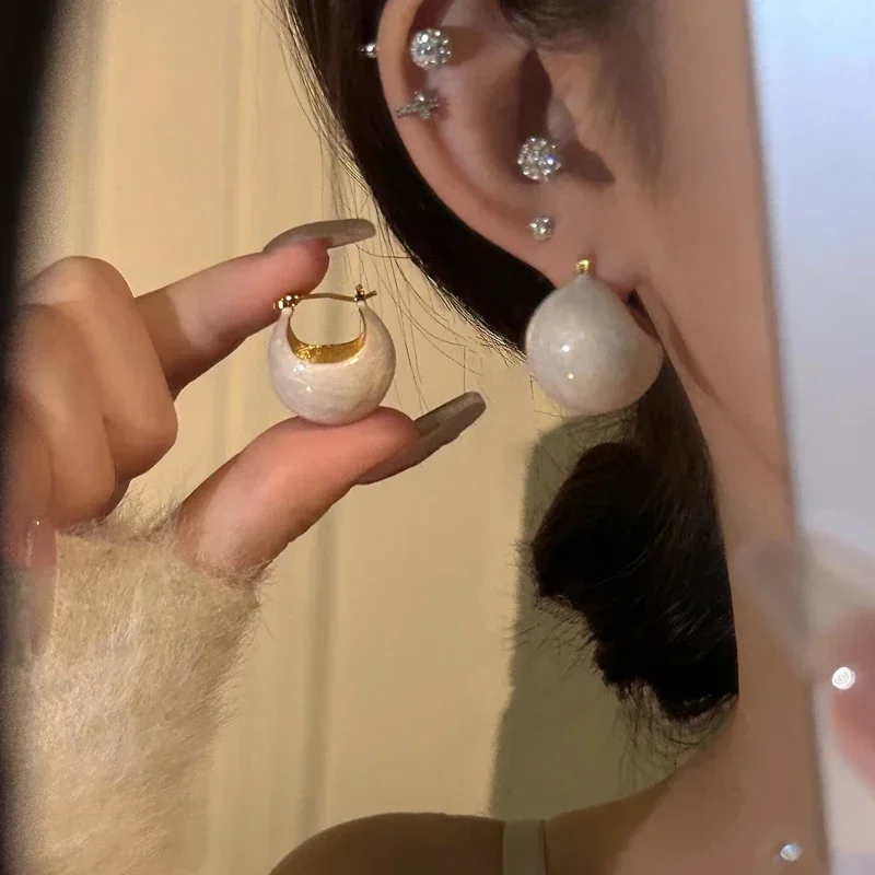 Retro fashionable enamel circle white earrings simple niche design cold wind