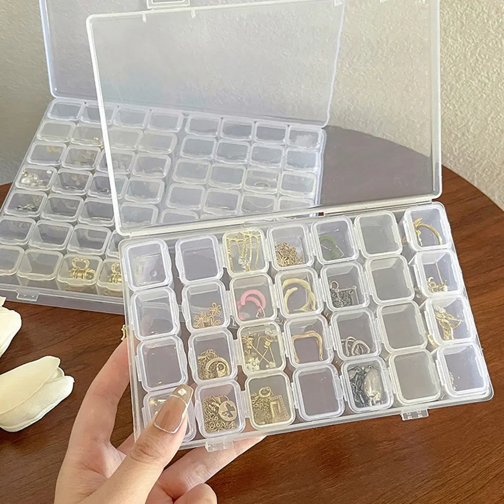 

Прозрачная пластиковая коробка-органайзер для украшений: серьги, ожерелья. Портативный, пыленепроницаемый, прозрачный дизайн. Идеально для Дня святого Валентина и Рождества.