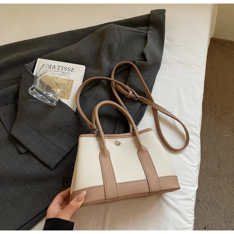 Bolsos de mano para mujer a la moda hechos de cuero con patrón de lavanda con estilo moderno diario suave y espacioso refinado de París informal ​