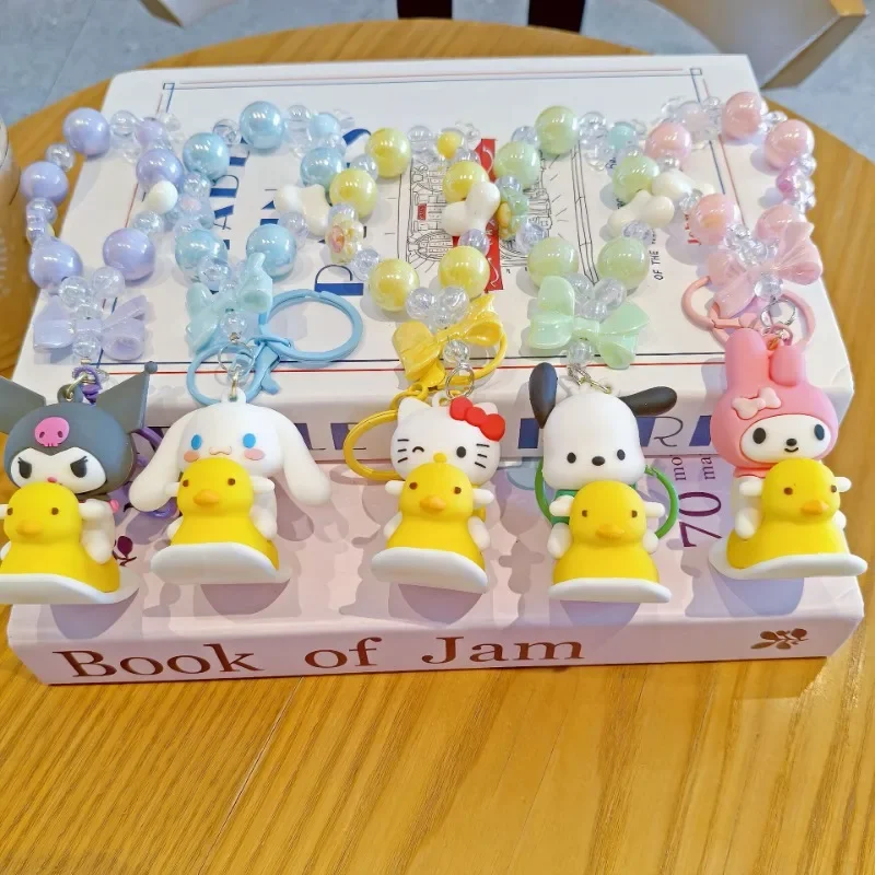 Miniso Sanrio Cartoon Rocking Duck Bead Breloczek do telefonu komórkowego Spersonalizowany breloczek do plecaka Breloczki do kluczy samochodowych Śliczny brelok do kluczy