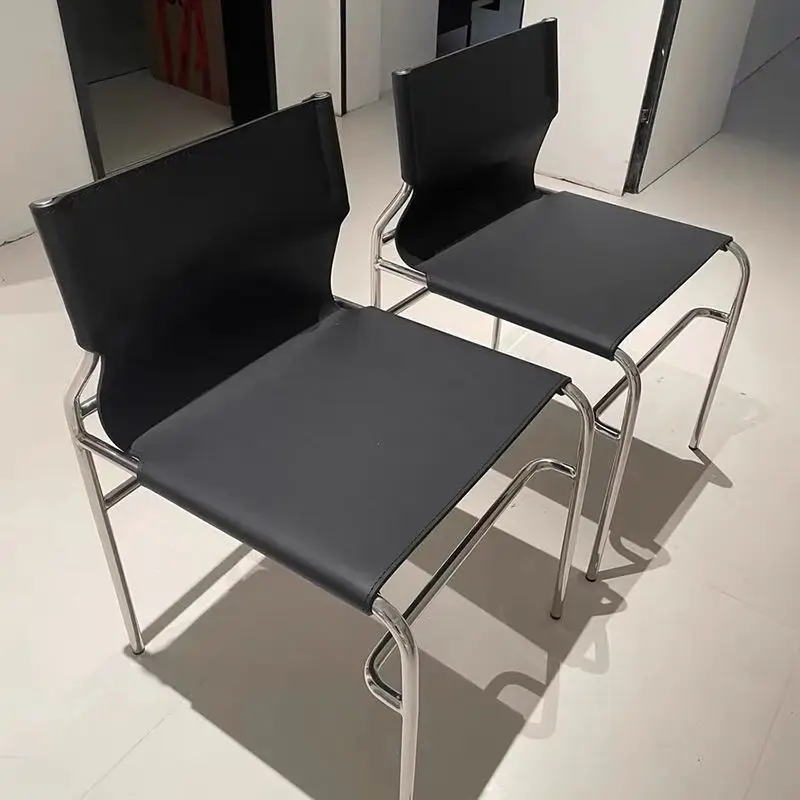 

Italian minimalist saddle leather dining chair Nordic designer chair light luxury restaurant hotel book chair negotiation chair