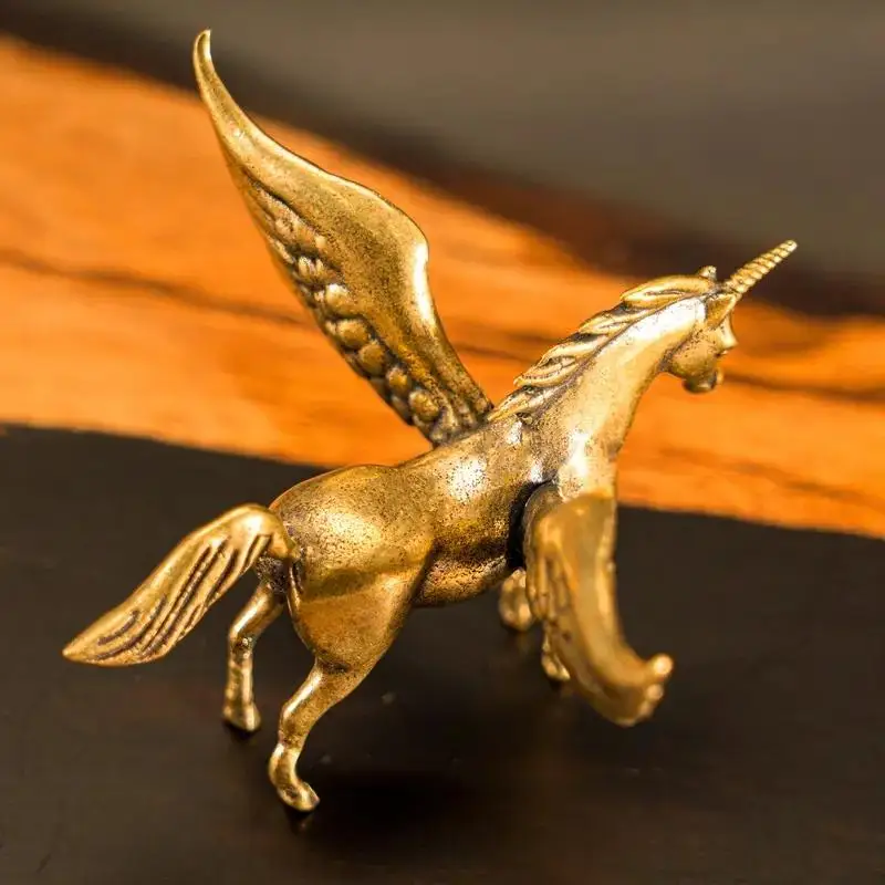 A vintage bronze, fantasy-themed, winged mythical horse figurine, suitable for bookshelf or desktop decoration.