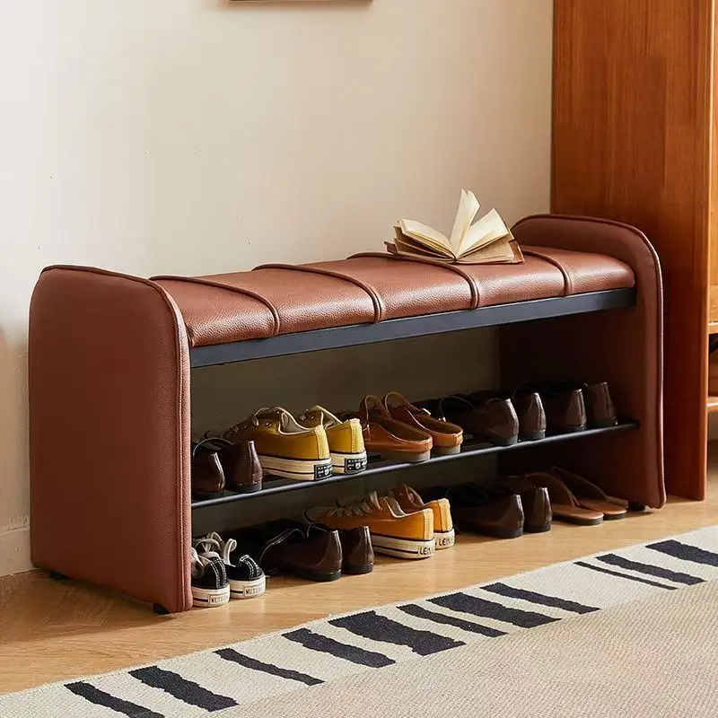 The shoe changing stool is integrated with household storage at the door