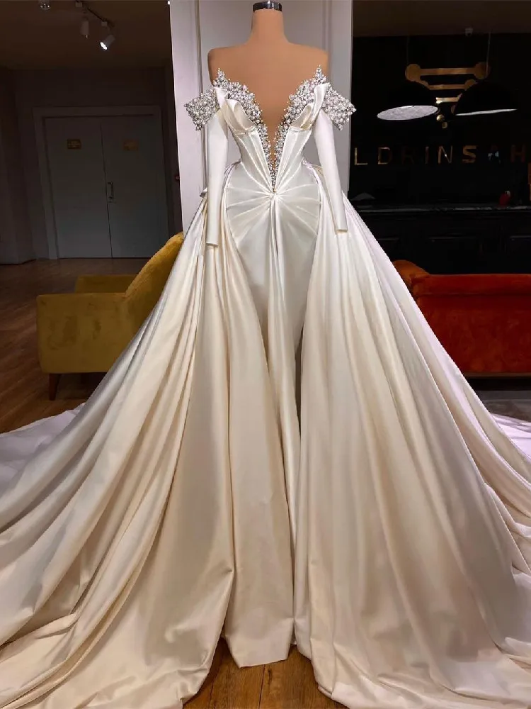 

Modern Mermaid Wedding Dresses Long Sleeves V Neck Pearls Sequins Appliques Beaded Detachable TrainBridal Gowns Vestina De Novia