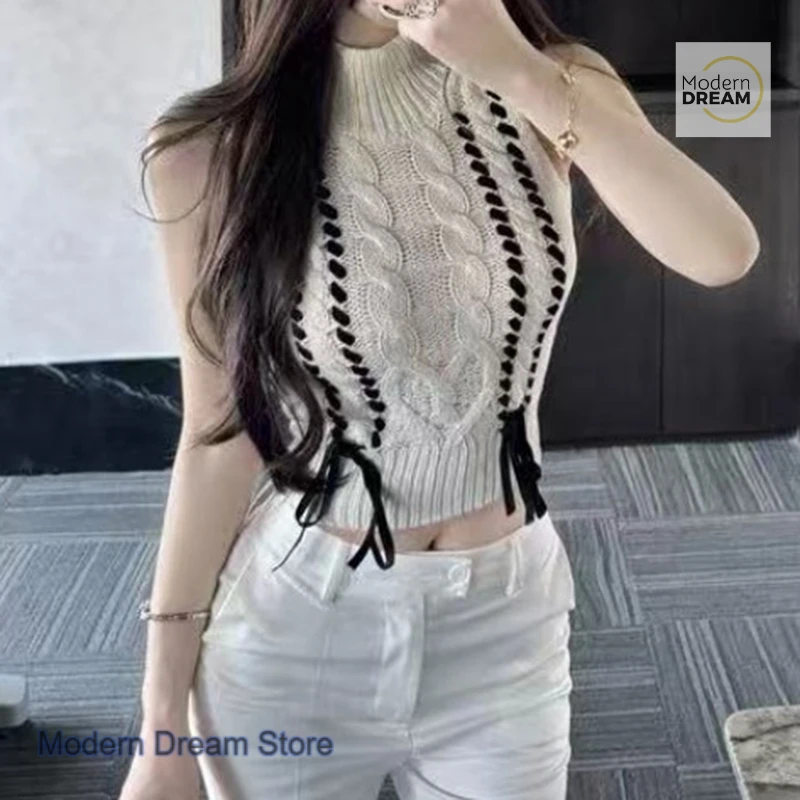 Gilet lavorato a maglia a collo mezzo alto da ragazza speziata dolce in stile coreano, design di nicchia autunnale e invernale da donna con top senza maniche con fiocco.