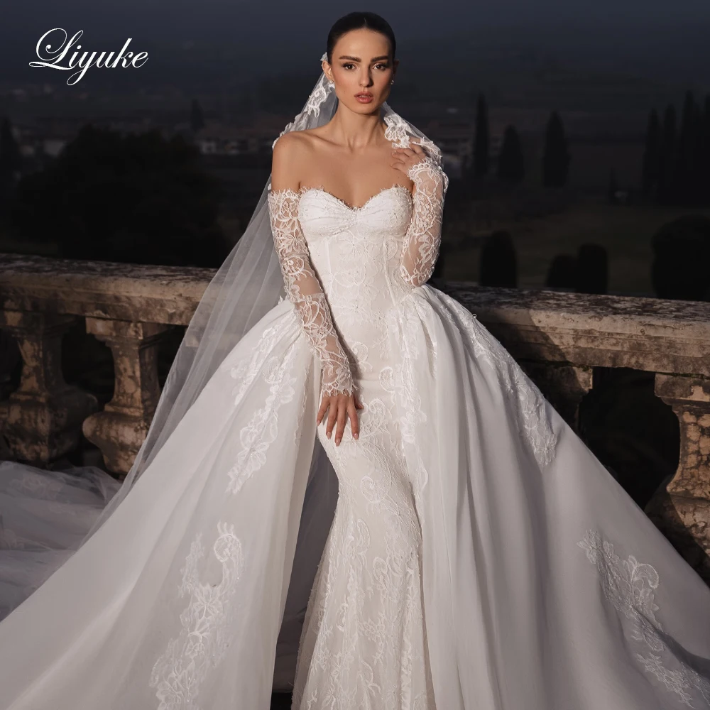 Свадебные платья Liyuke Custom Made Elegance 2 в 1: элегантные платья-русалки с вырезом «сердечко», блестящим кружевом, длинными рукавами и съемным шлейфом.