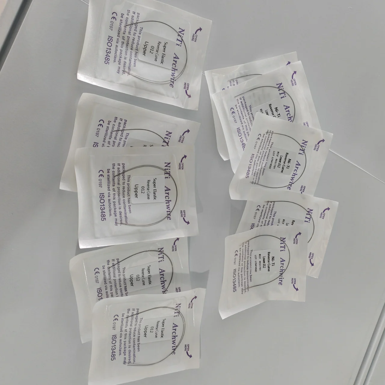 

10Packs 20Pcs Orthodontic Dental Niti Reverse Curve Round Rectangular Wire (5Packs Upper and 5Packs Lower)