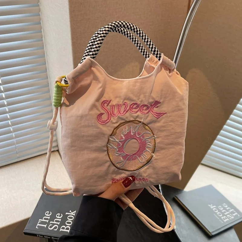 

New Faion Korean Sle Versatile Small Embroidered Nylon oulder Bag Donut ape Crossbody Phone Bag for Youth Casual