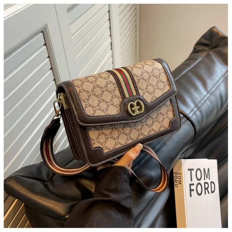 Classic and versatile vintage single-shoulder women's bag with flip-up magnetic closure and adjustable metal logo crossbody bag