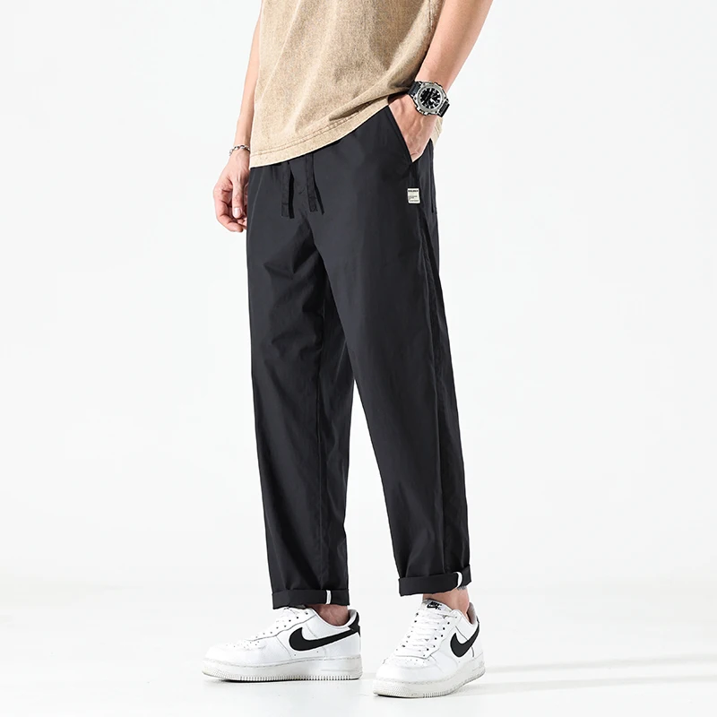 

Летние тонкие хлопковые мужские свободные прямые повседневные брюки, модные, укороченные, абсолютно новые, трендовая мужская одежда 2025 года