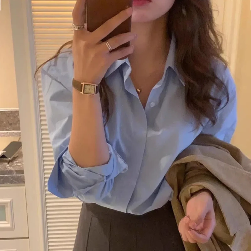 

French Commuting Versatile Blue Shirt Women in Spring 2025 New Inside Bottomed Shirt Stack Wearing Long -sleeved Tops