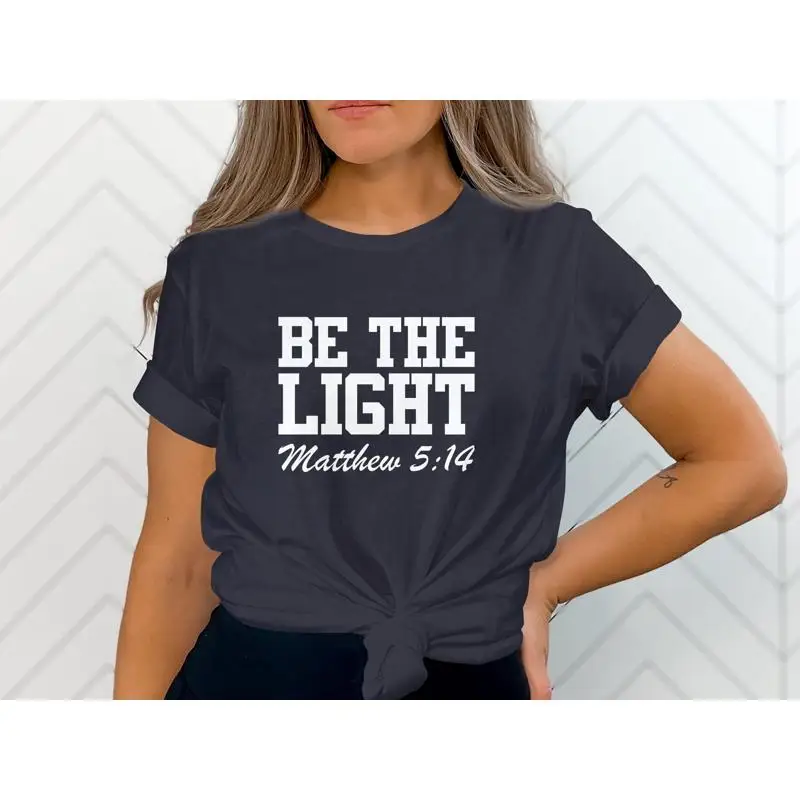 

Inspirational Christian T Shirt Be The Light Matthew 5 14 Bible Verse Religious Faith Top Church Apparel