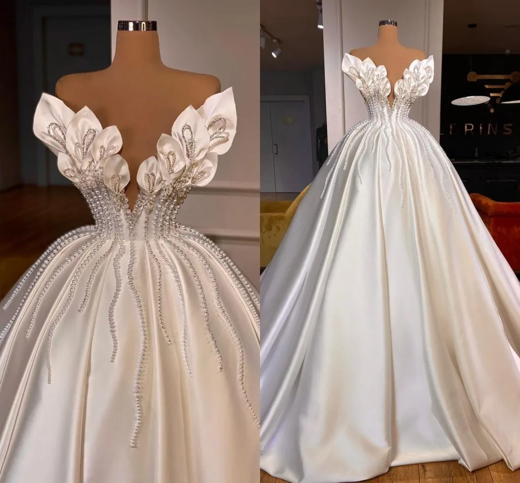 

Princess V Neck Shinny Pearls Beads Wedding Dress Sweep Train Robe De Mariée African Plus Size Satin Ballgown Puffy Bridal Gown