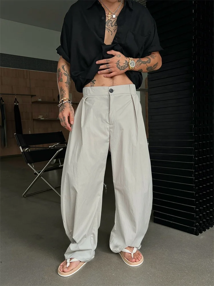 

ay Asymmetrical Pleated Design Qui Dry Casual Pants Men Loose Silhouette Wide Leg Knife ape Summer New Arrival