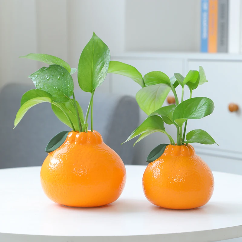 مزهرية برتقالية محاكاة من السيراميك لرفع الماء وسلة خضراء وعاء زهور مائي