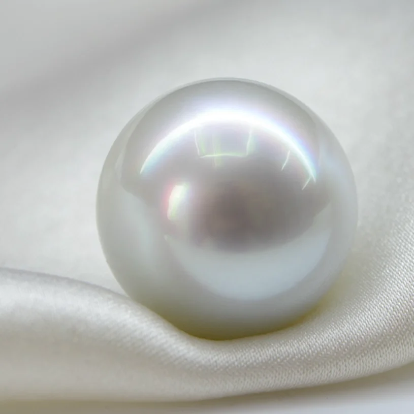 

CHARMING 10-11MM AAA SOUTH SEA CULTURED WHITE ROUND LOOSE PEARL UNDRILLED