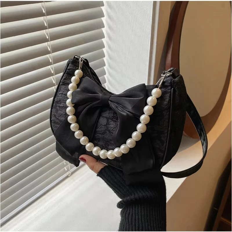 

Fashion bow handheld pearl bag trend new crossbody small bag ladies shoulder bag 1 sold
