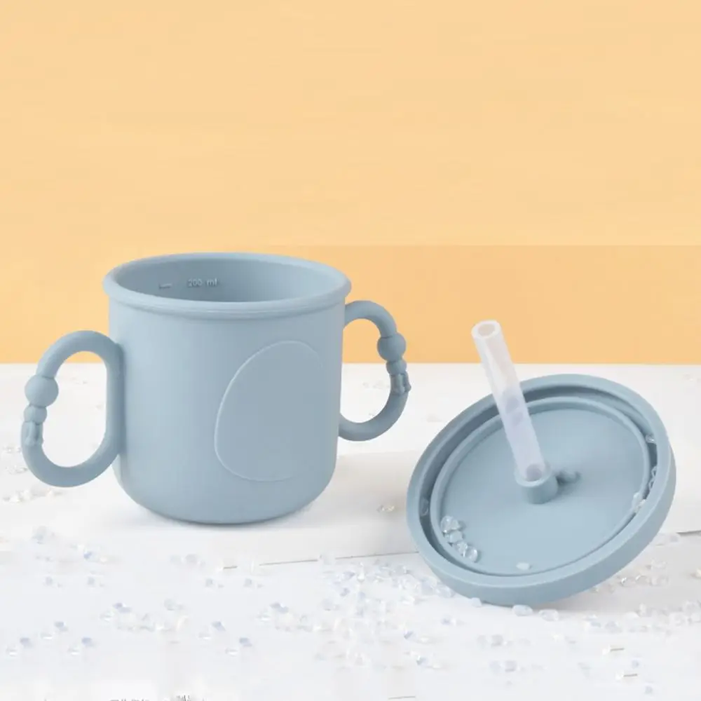 

Silicone Baby Training Cup Portable 200ml Toddler Sippy Cups Double Handle Penguin Print Toddlers Straw Water Bottle Kid