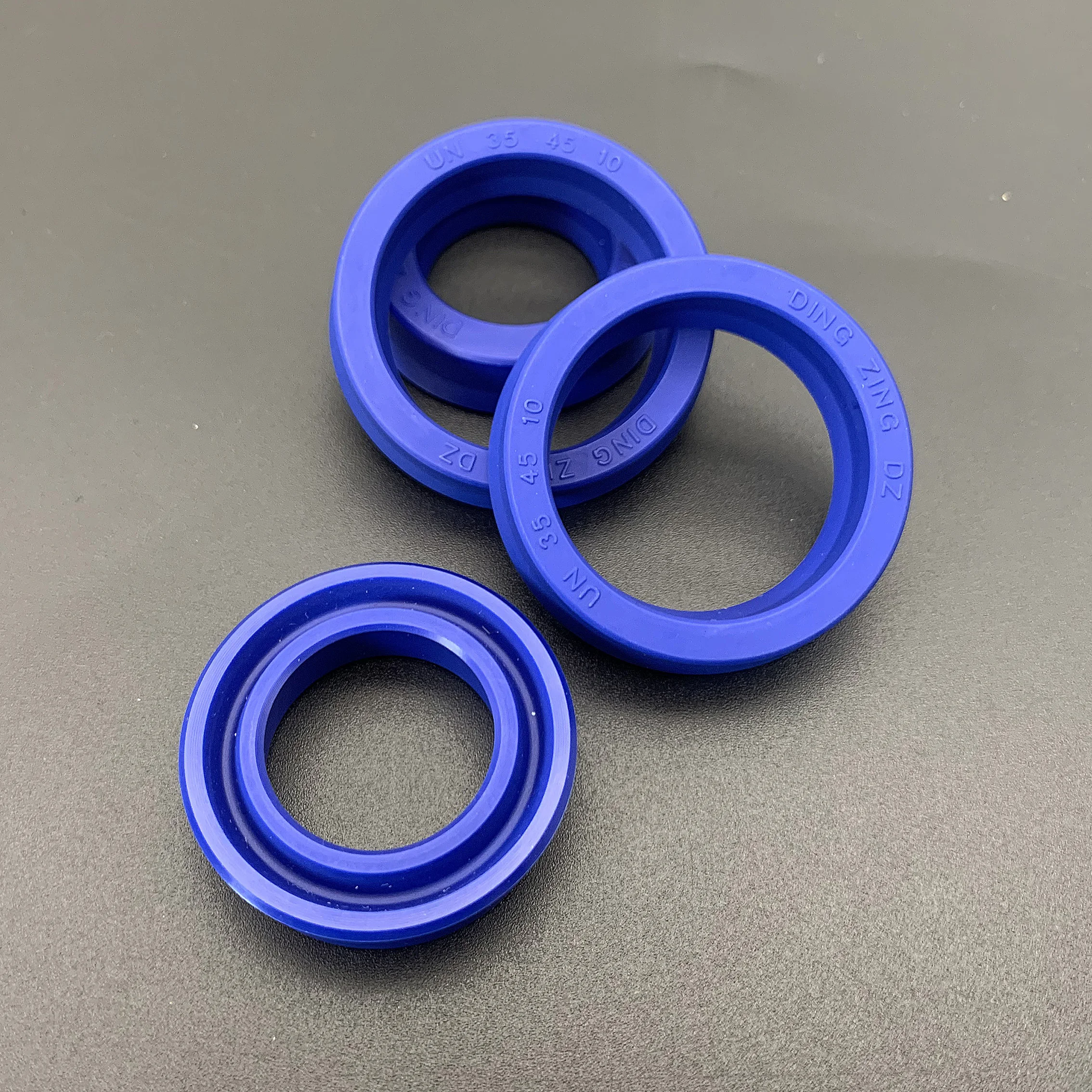 Cincin Seal Oli Tipe UN Biru Poliuretan ID 22mm~25mm OD 28mm~50mm Performa Segel Unggul untuk Otomotif & Traktor