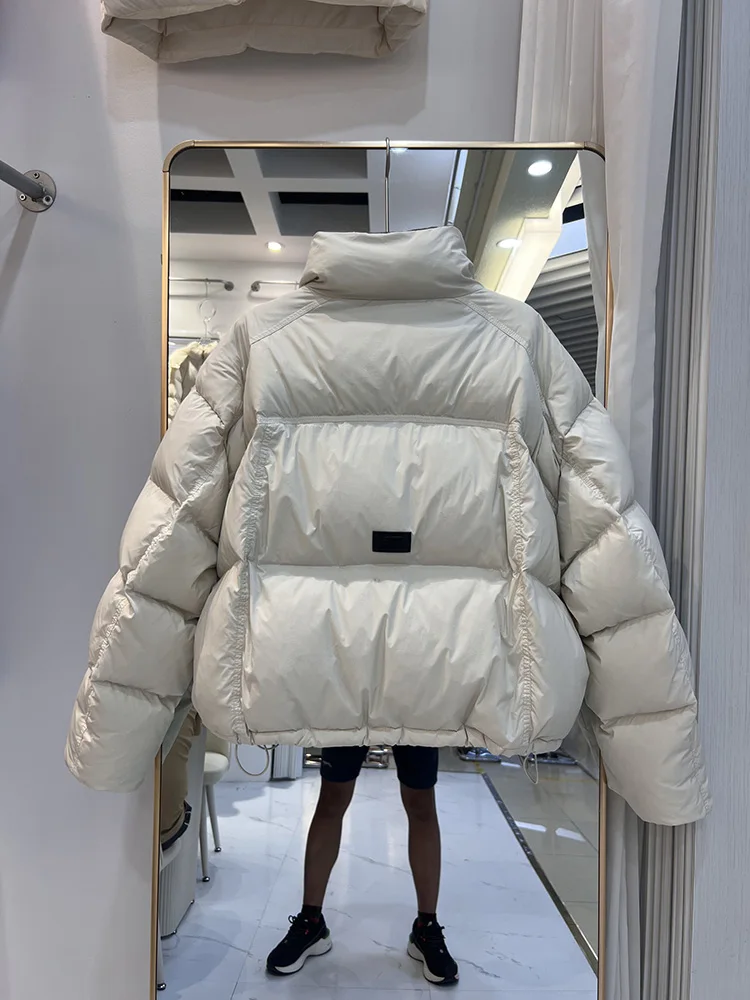 سترة شتوية جديدة بسيطة للنساء بنمط قصير النسخة الكورية بياقة واقفة ورباط غير متماثل معطف أسفل البط