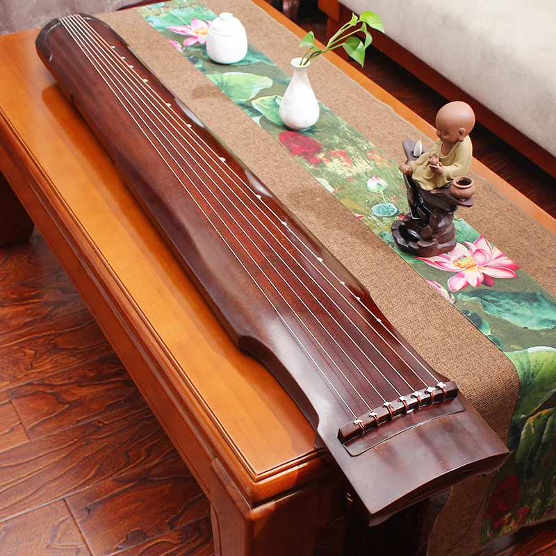 

Guqin old fir Zhongni chaotic Fuxi beginner performance level pure manual