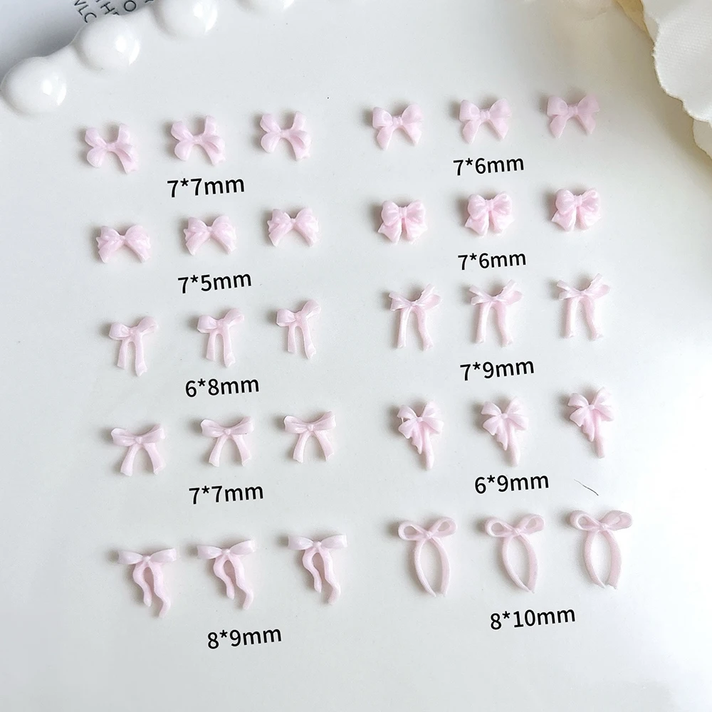 50 stücke Mix Stile Rosa Bowknot Nagel Charms Band 3D aushöhlen Kawaii Nagel Dekorationen Harz Bogen Schmetterling Maniküre diy Teile
