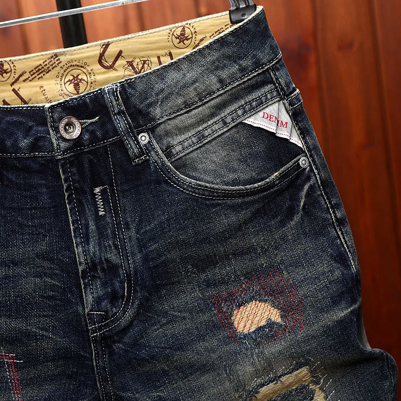 High end ripped patch denim shorts for men in the summer of 2025, scraped and fashionable trend, classic retro pants