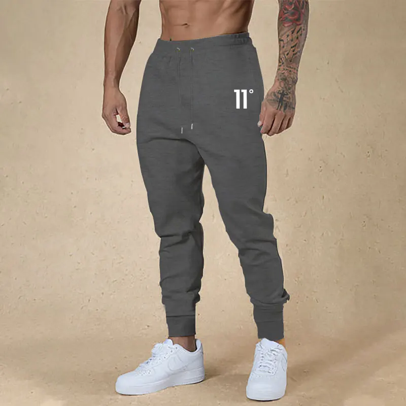 

Spring And Autumn New Men's Sports Pants Casual Solid Color Bunches Small Foot Nine-minute Trousers Running Training Pants