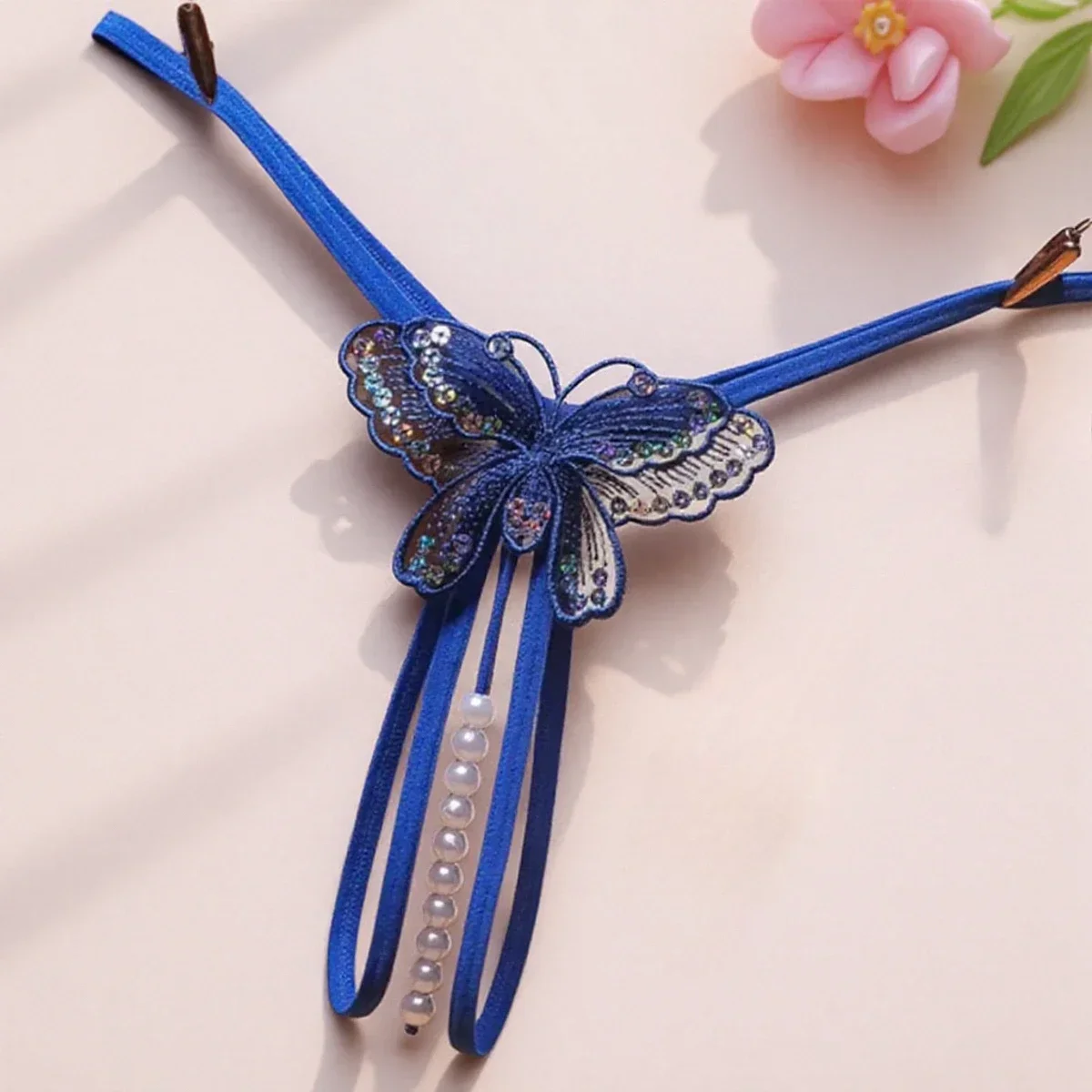 المرأة مثير مطرز ندف ملف مفتوح الملابس الداخلية مثير فراشة الملابس الداخلية الترتر تدليك T على شكل ثونغ