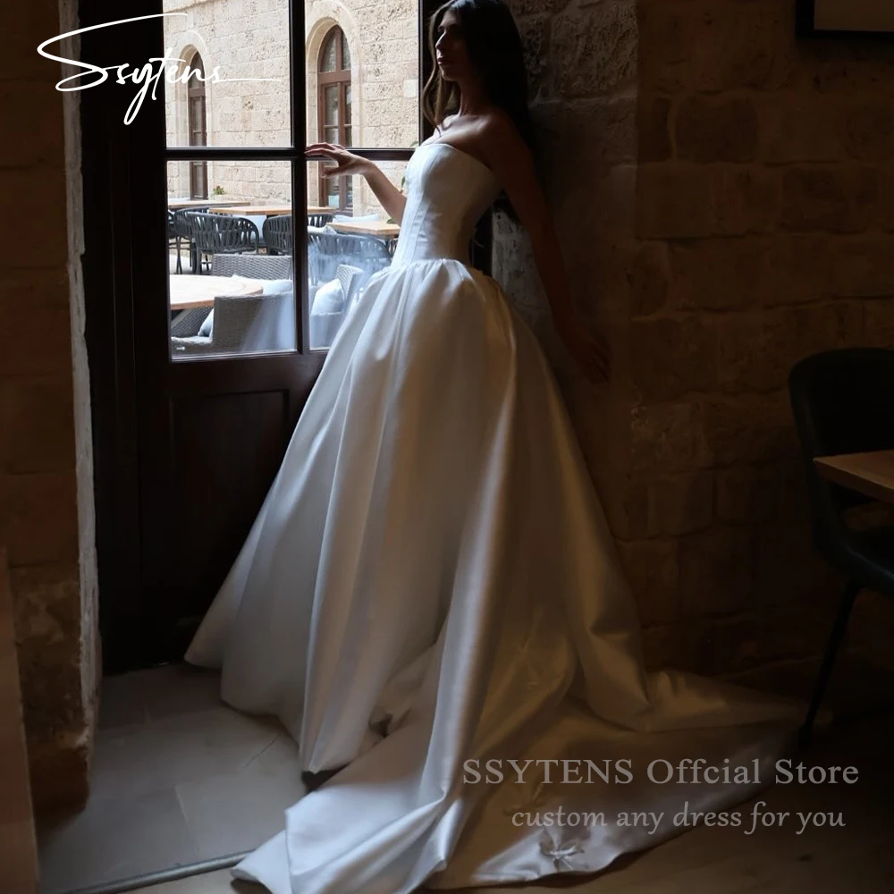 

SSYTENS Элегантные свадебные платья принцессы трапециевидной формы, белые платья невесты без бретелек без рукавов с бантом 2026, гражданские свадебные платья по индивидуальному заказу