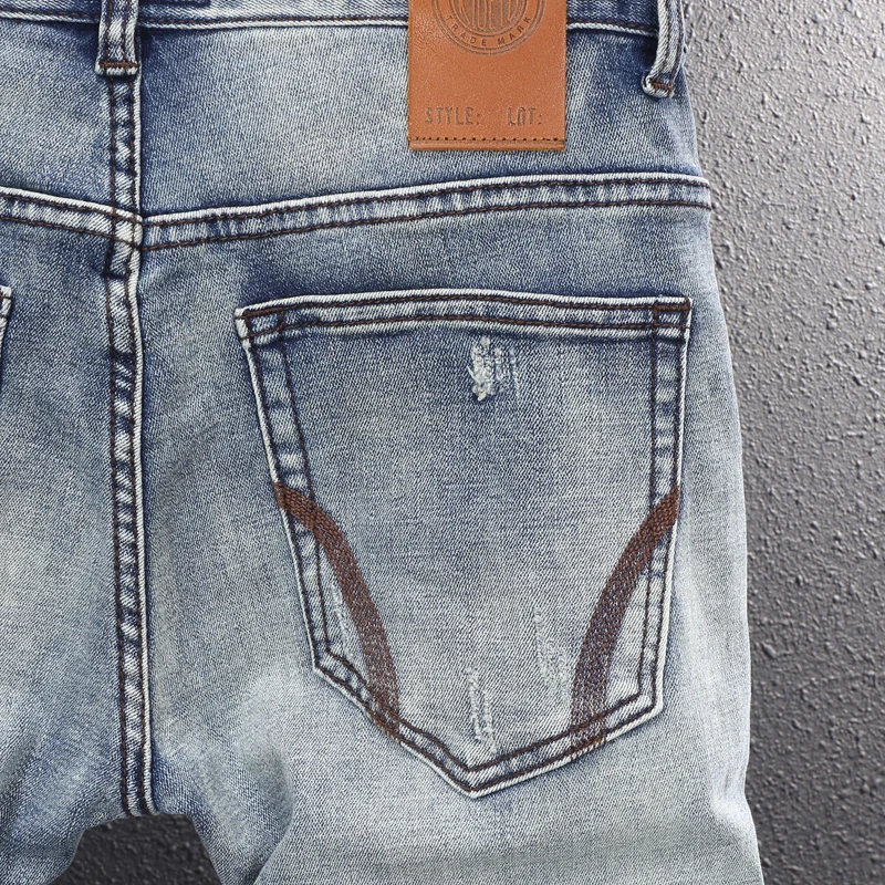 Fashion Designer Men Jeans Retro Blue Stretch Slim Fit Embroidery Hole Ripped Jeans Men Trousers Printed Vintage Pants Hombre