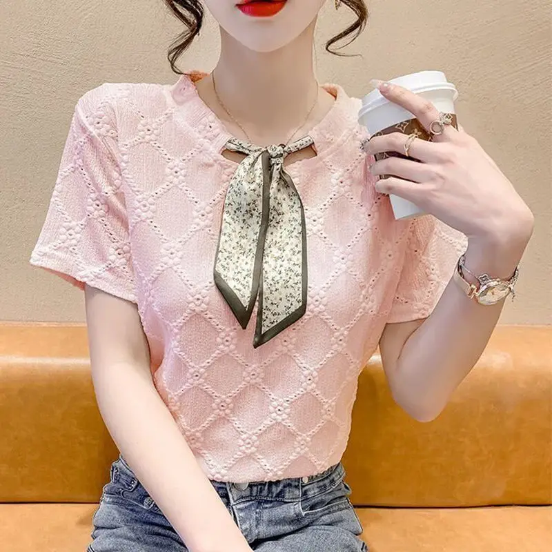 2023 Summer Fashion Korean Edition Round Neck Lace Up Reduced Age Lace Hollow Jacquard Short Sleeve Women\'s Solid Color Shirt