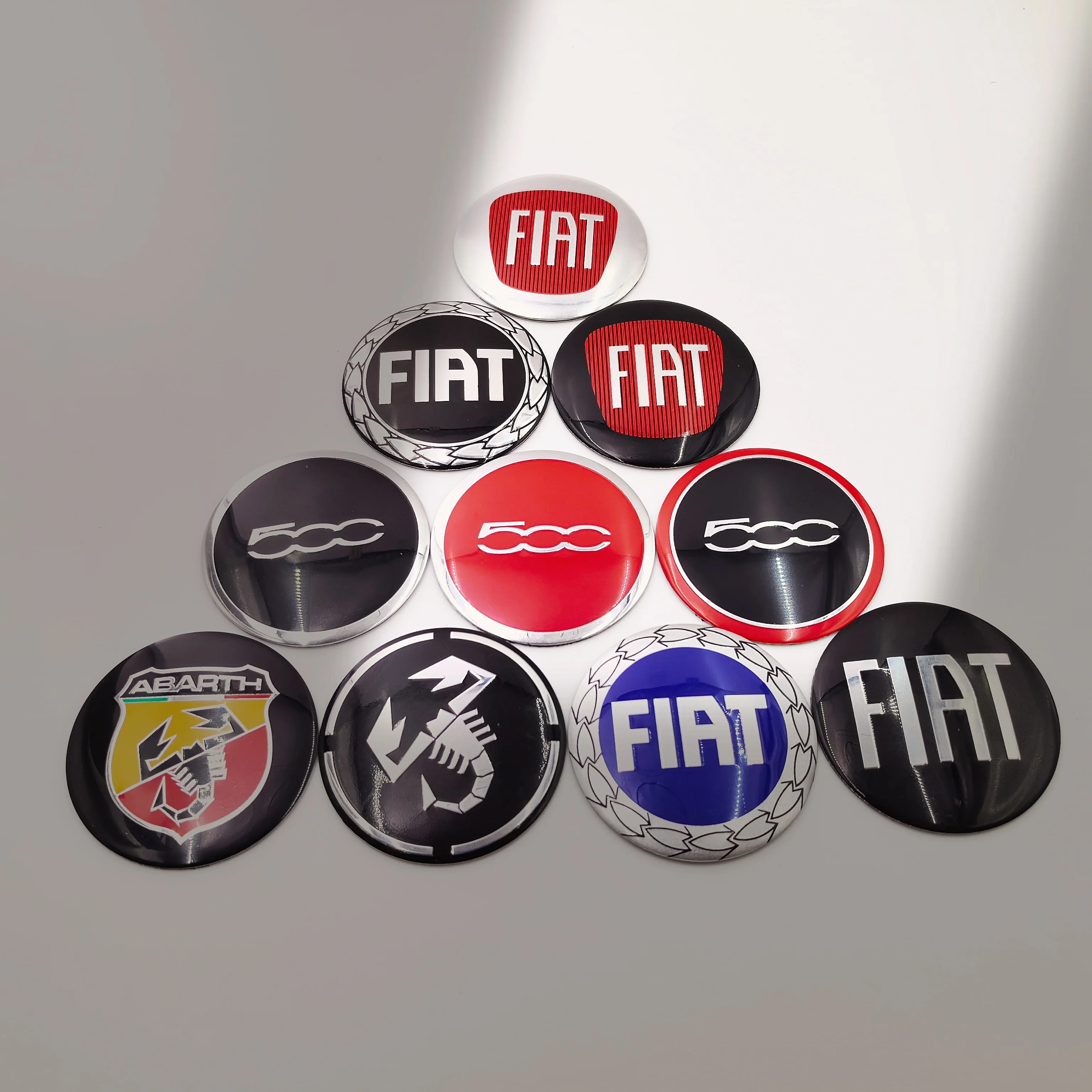 20 piezas 56/60/65mm tapa central de rueda de coche insignia Logo pegatina cubierta de cubo calcomanía tapa de llanta logotipo de rueda insignia calcomanía para FIAT 500 Abarth