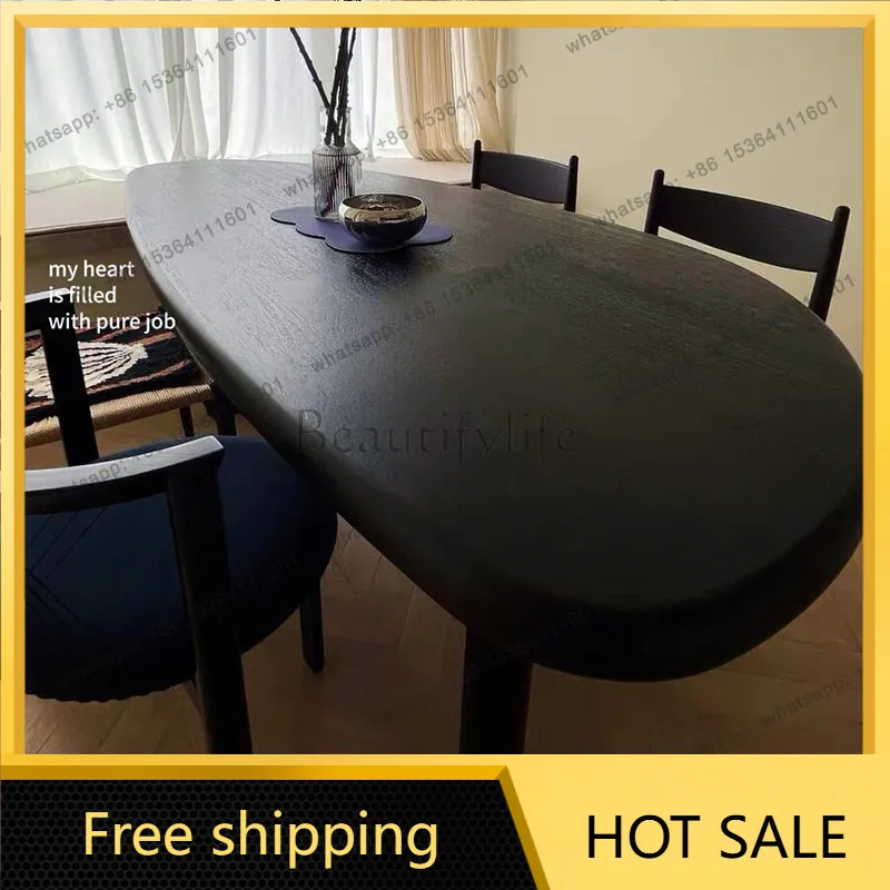 XX. French modern simple solid wood oval dining table household small apartment black