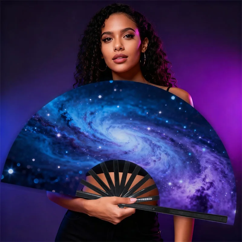 One Handheld Fan for Men Featuring a Design Inspired by The Cosmic Spiral Galaxy. This Portable Cooling Device Is Perfect for Stage Performances, Parties, Cosplay Events, And Clubs, Showcasing a Euro-American Style with a Striking Shine