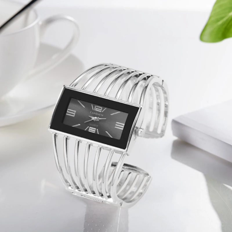 ساعة كوارتز نسائية مجوفة ، ساعات يد نسائية ، سوار معدني إبداعي ، اتجاه متعدد الاستخدامات ، راقي ، أزياء فاخرة