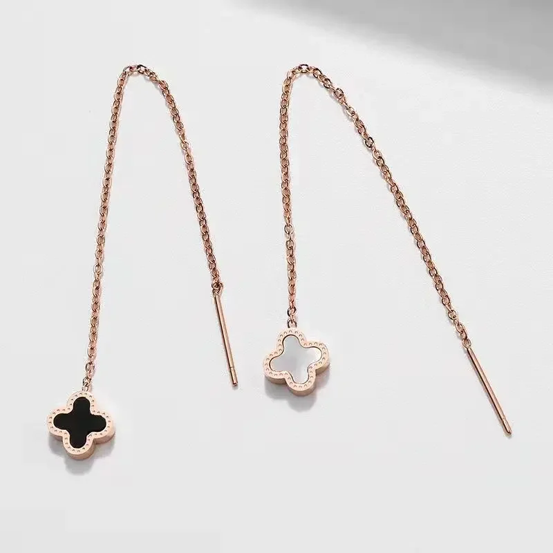 

Ladies fashion elegance double-sided lucky grass long earrings French retro stainless steel light luxury earrings