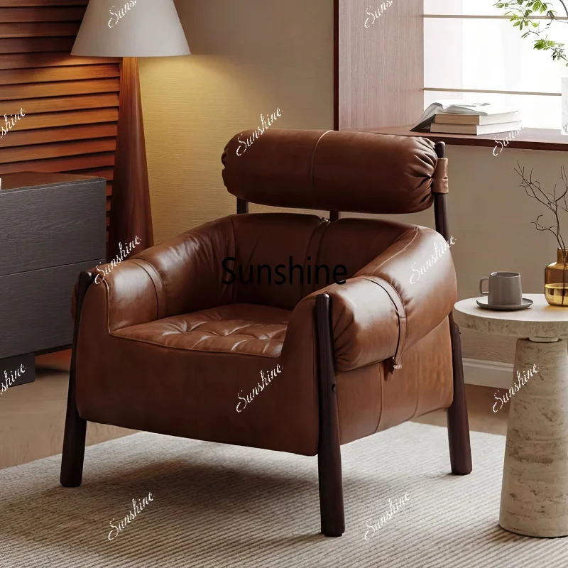 Antique single sofa chair in the living room, retro light luxury high-end minimalist single chair