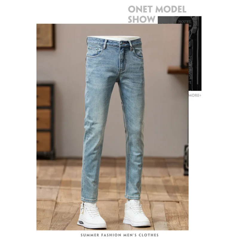 Otoño simple y versátil retro azul claro pantalones vaqueros de hombre ajustados pies pequeños moda casual versión coreana pantalones de hombre