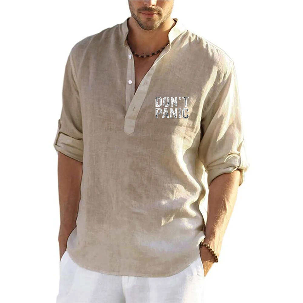 Dont Panic Funny Retro The man is wearing a long-sleeved linen shirt that is lightweight and breathable T shirt